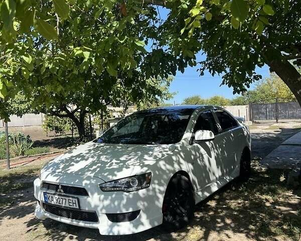 Белый Мицубиси Лансер, объемом двигателя 2.4 л и пробегом 208 тыс. км за 7500 $, фото 1 на Automoto.ua