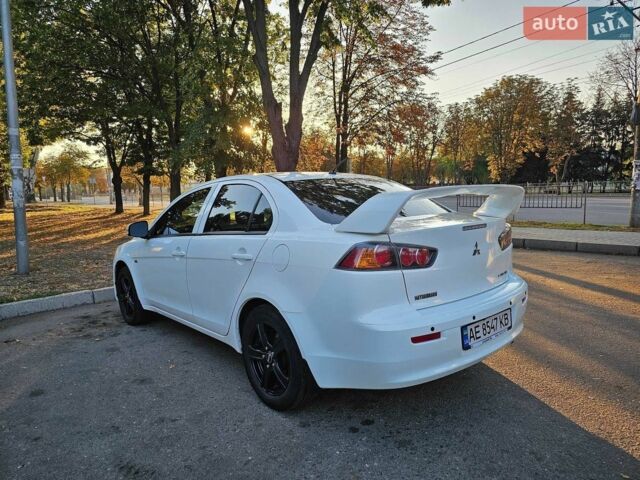 Білий Міцубісі Lancer, об'ємом двигуна 1.6 л та пробігом 192 тис. км за 8920 $, фото 1 на Automoto.ua