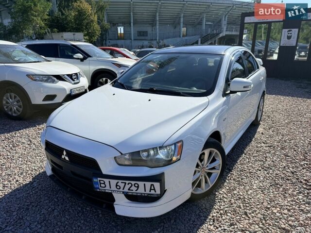 Білий Міцубісі Lancer, об'ємом двигуна 2 л та пробігом 155 тис. км за 9400 $, фото 1 на Automoto.ua