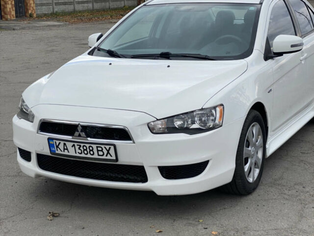 Білий Міцубісі Lancer, об'ємом двигуна 2 л та пробігом 230 тис. км за 8600 $, фото 1 на Automoto.ua
