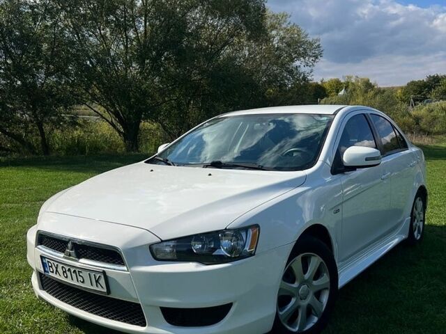 Білий Міцубісі Lancer, об'ємом двигуна 2 л та пробігом 230 тис. км за 8700 $, фото 1 на Automoto.ua