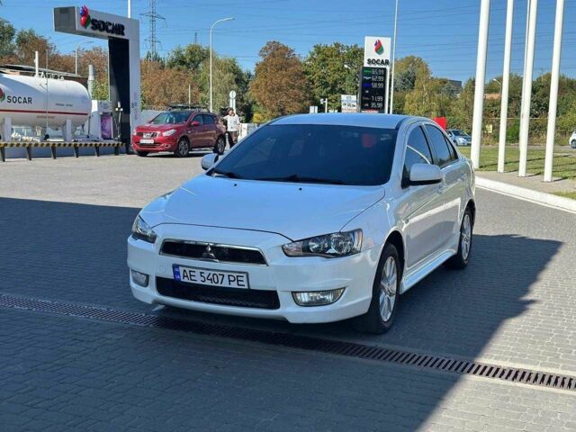 Белый Мицубиси Лансер, объемом двигателя 2 л и пробегом 113 тыс. км за 8500 $, фото 1 на Automoto.ua
