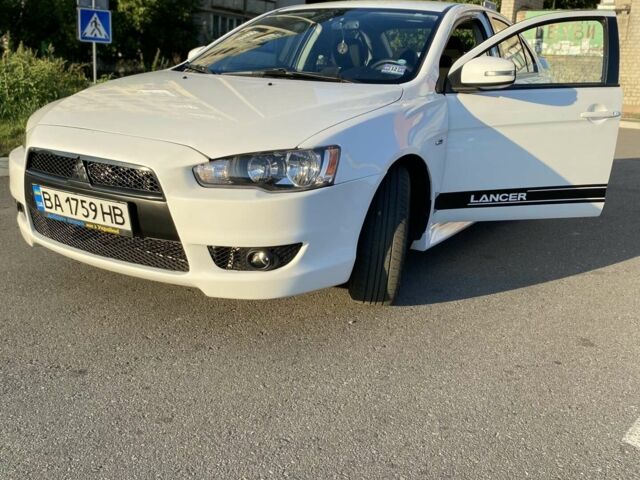 Білий Міцубісі Lancer, об'ємом двигуна 2 л та пробігом 135 тис. км за 8200 $, фото 1 на Automoto.ua