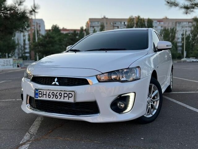 Білий Міцубісі Lancer, об'ємом двигуна 2 л та пробігом 66 тис. км за 9499 $, фото 1 на Automoto.ua