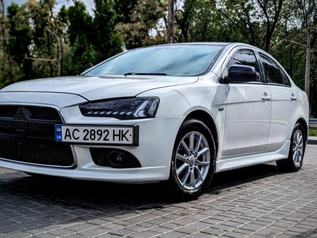 Білий Міцубісі Lancer, об'ємом двигуна 2 л та пробігом 148 тис. км за 8999 $, фото 1 на Automoto.ua