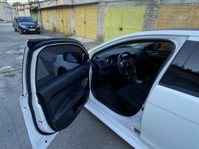 Білий Міцубісі Lancer, об'ємом двигуна 2 л та пробігом 114 тис. км за 9500 $, фото 1 на Automoto.ua