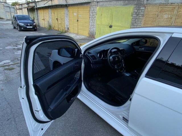 Білий Міцубісі Lancer, об'ємом двигуна 2 л та пробігом 114 тис. км за 9500 $, фото 1 на Automoto.ua
