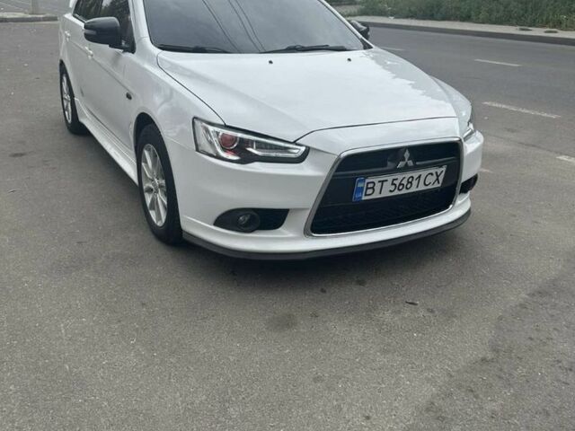 Белый Мицубиси Лансер, объемом двигателя 2 л и пробегом 170 тыс. км за 8998 $, фото 1 на Automoto.ua