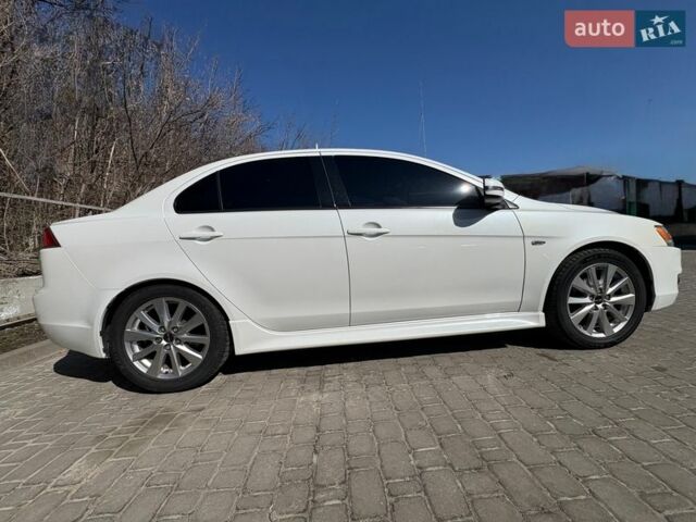 Белый Мицубиси Лансер, объемом двигателя 2.36 л и пробегом 156 тыс. км за 8900 $, фото 1 на Automoto.ua