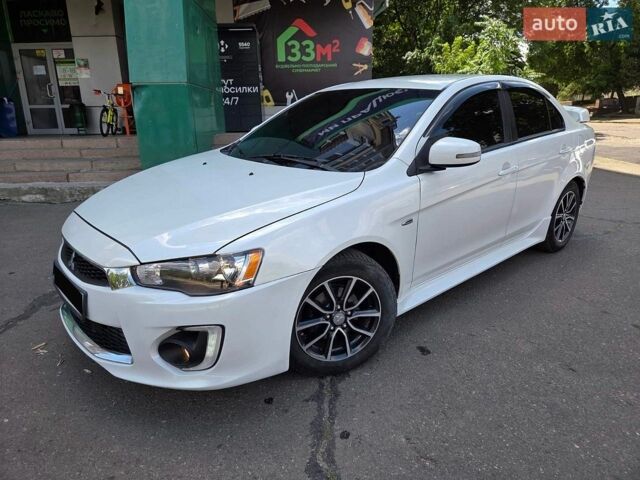 Білий Міцубісі Lancer, об'ємом двигуна 2 л та пробігом 113 тис. км за 9600 $, фото 1 на Automoto.ua