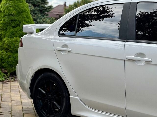 Білий Міцубісі Lancer, об'ємом двигуна 2 л та пробігом 194 тис. км за 8999 $, фото 1 на Automoto.ua