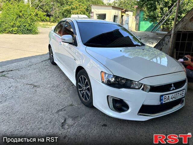 Білий Міцубісі Lancer, об'ємом двигуна 2 л та пробігом 115 тис. км за 9000 $, фото 1 на Automoto.ua