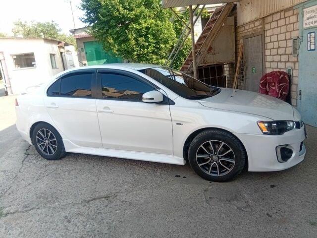 Білий Міцубісі Lancer, об'ємом двигуна 2 л та пробігом 115 тис. км за 10087 $, фото 1 на Automoto.ua