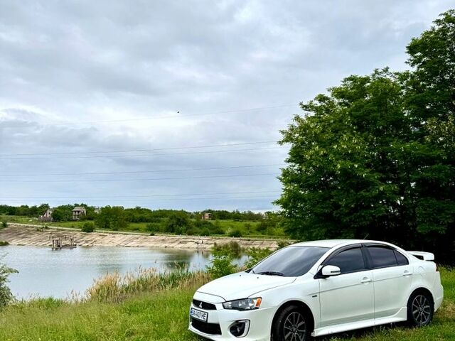 Белый Мицубиси Лансер, объемом двигателя 2 л и пробегом 100 тыс. км за 8750 $, фото 1 на Automoto.ua