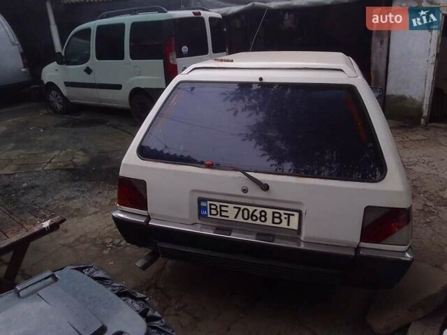 Белый Мицубиси Лансер, объемом двигателя 1.47 л и пробегом 300 тыс. км за 1100 $, фото 1 на Automoto.ua