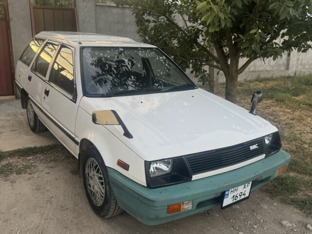 Білий Міцубісі Lancer, об'ємом двигуна 1.5 л та пробігом 275 тис. км за 1951 $, фото 1 на Automoto.ua
