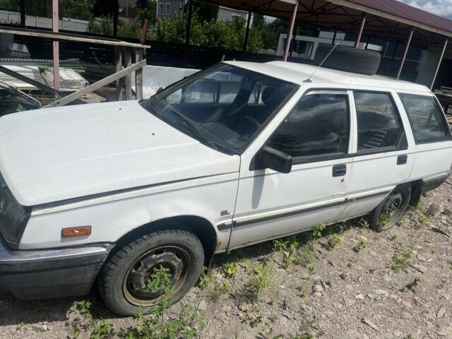 Белый Мицубиси Лансер, объемом двигателя 1.9 л и пробегом 438 тыс. км за 463 $, фото 1 на Automoto.ua