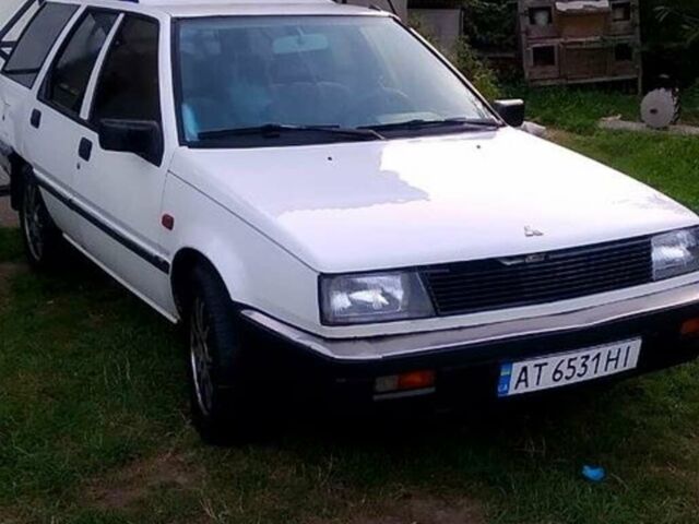 Белый Мицубиси Лансер, объемом двигателя 1.5 л и пробегом 130 тыс. км за 1100 $, фото 1 на Automoto.ua