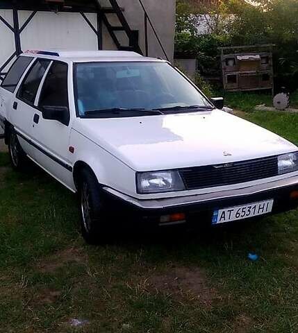 Белый Мицубиси Лансер, объемом двигателя 1.5 л и пробегом 130 тыс. км за 1100 $, фото 1 на Automoto.ua