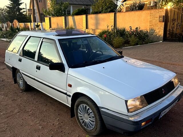 Белый Мицубиси Лансер, объемом двигателя 1.5 л и пробегом 55 тыс. км за 1500 $, фото 1 на Automoto.ua