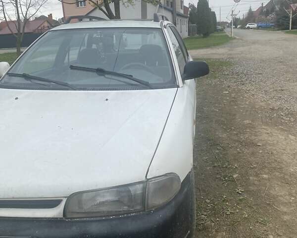 Белый Мицубиси Лансер, объемом двигателя 1.6 л и пробегом 500 тыс. км за 1700 $, фото 1 на Automoto.ua