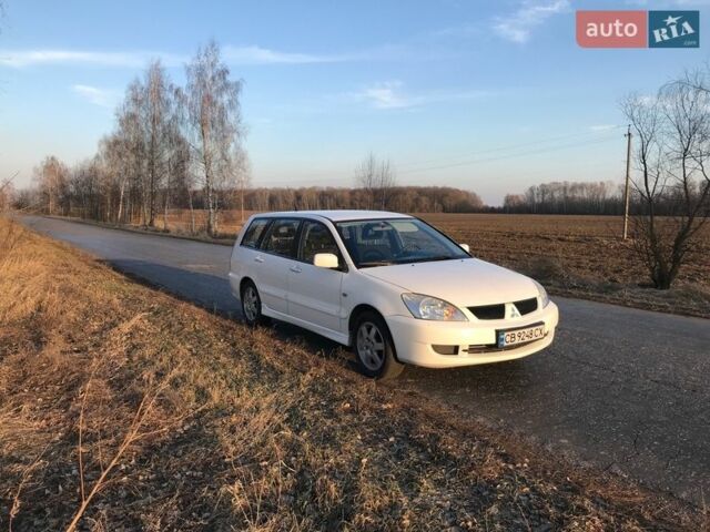 Білий Міцубісі Lancer, об'ємом двигуна 1.6 л та пробігом 231 тис. км за 4300 $, фото 1 на Automoto.ua