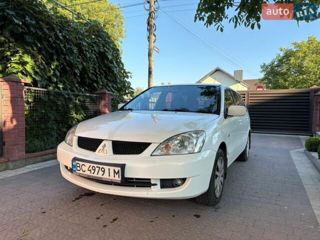 Білий Міцубісі Lancer, об'ємом двигуна 1.6 л та пробігом 303 тис. км за 4000 $, фото 1 на Automoto.ua
