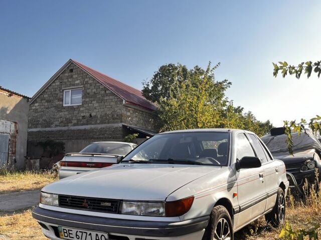 Білий Міцубісі Lancer, об'ємом двигуна 1.8 л та пробігом 350 тис. км за 2100 $, фото 1 на Automoto.ua