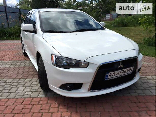 Білий Міцубісі Lancer, об'ємом двигуна 1.6 л та пробігом 69 тис. км за 11300 $, фото 1 на Automoto.ua