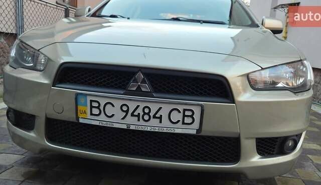 Бежевий Міцубісі Lancer, об'ємом двигуна 1.8 л та пробігом 204 тис. км за 7300 $, фото 1 на Automoto.ua