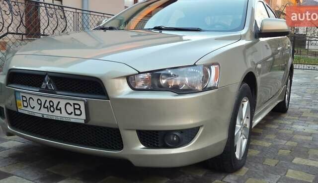 Бежевий Міцубісі Lancer, об'ємом двигуна 1.8 л та пробігом 204 тис. км за 7500 $, фото 1 на Automoto.ua