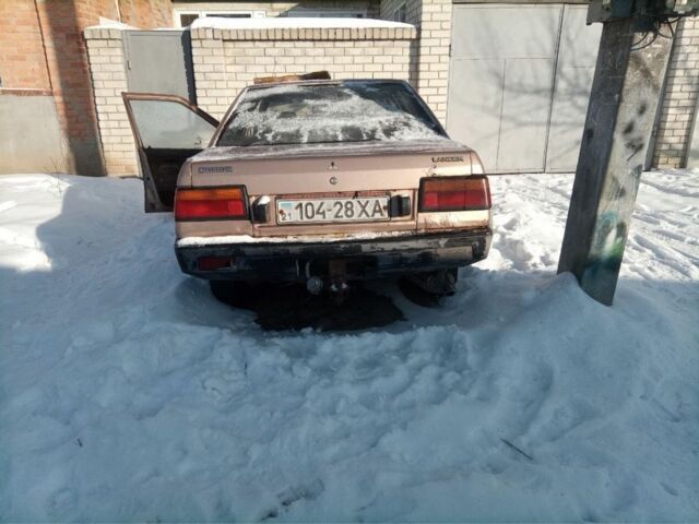 Бежевый Мицубиси Лансер, объемом двигателя 1.6 л и пробегом 250 тыс. км за 200 $, фото 1 на Automoto.ua