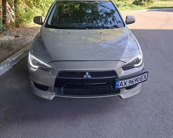 Бежевый Мицубиси Лансер, объемом двигателя 2 л и пробегом 142 тыс. км за 6300 $, фото 1 на Automoto.ua