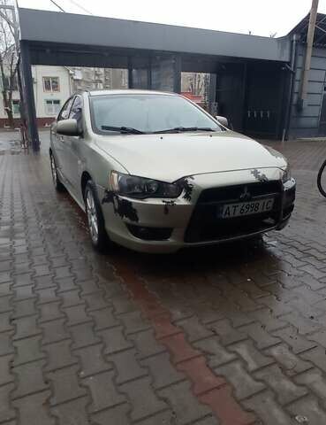 Бежевий Міцубісі Lancer, об'ємом двигуна 2 л та пробігом 200 тис. км за 6500 $, фото 1 на Automoto.ua