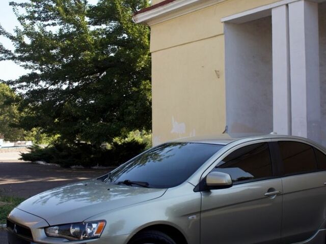 Бежевий Міцубісі Lancer, об'ємом двигуна 2 л та пробігом 220 тис. км за 7900 $, фото 1 на Automoto.ua