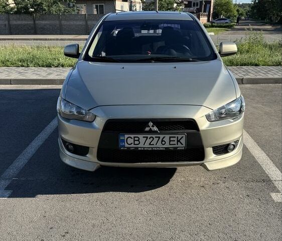 Бежевий Міцубісі Lancer, об'ємом двигуна 2 л та пробігом 264 тис. км за 5600 $, фото 1 на Automoto.ua