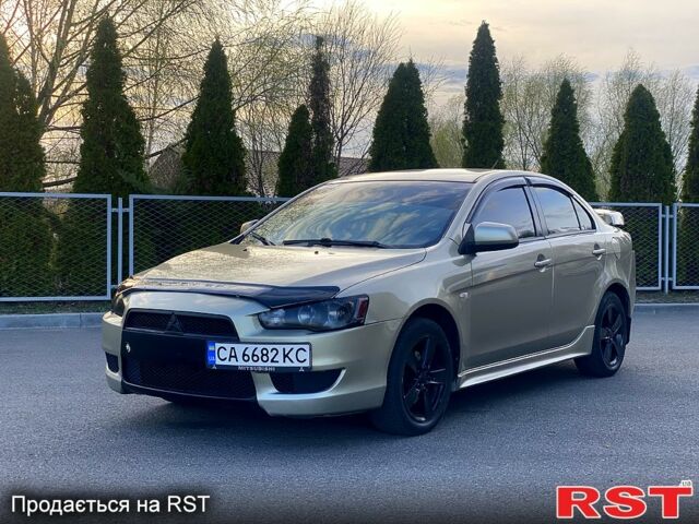 Бежевий Міцубісі Lancer, об'ємом двигуна 2 л та пробігом 171 тис. км за 6950 $, фото 1 на Automoto.ua