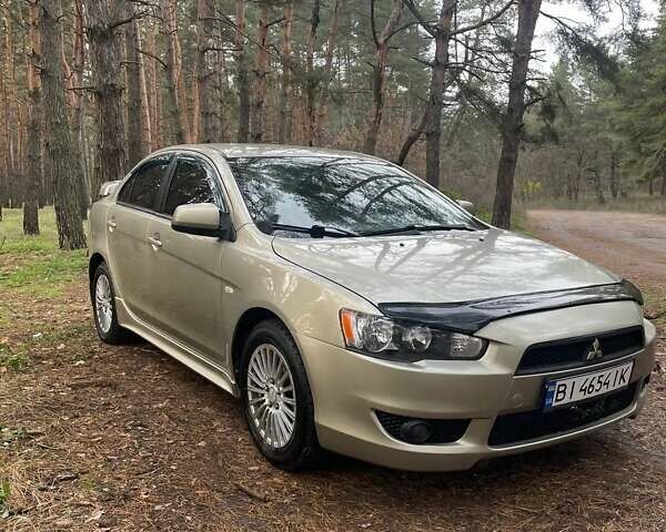 Бежевий Міцубісі Lancer, об'ємом двигуна 2 л та пробігом 262 тис. км за 6500 $, фото 1 на Automoto.ua