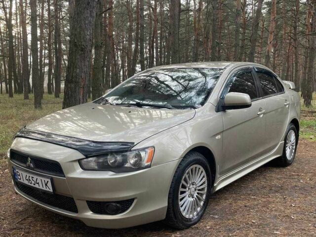 Бежевий Міцубісі Lancer, об'ємом двигуна 2 л та пробігом 262 тис. км за 6000 $, фото 1 на Automoto.ua