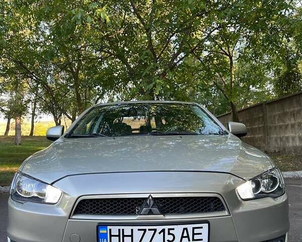 Бежевый Мицубиси Лансер, объемом двигателя 2 л и пробегом 146 тыс. км за 7750 $, фото 1 на Automoto.ua