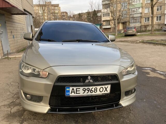 Бежевий Міцубісі Lancer, об'ємом двигуна 2 л та пробігом 133 тис. км за 8000 $, фото 1 на Automoto.ua