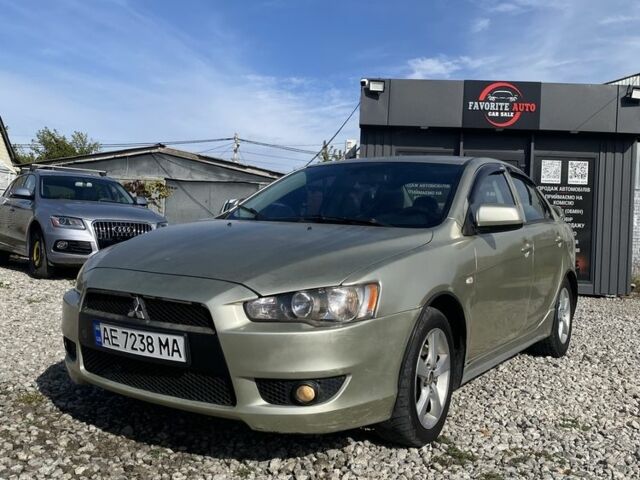 Бежевий Міцубісі Lancer, об'ємом двигуна 2 л та пробігом 253 тис. км за 5500 $, фото 1 на Automoto.ua