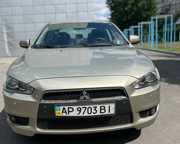 Бежевий Міцубісі Lancer, об'ємом двигуна 2 л та пробігом 163 тис. км за 7700 $, фото 1 на Automoto.ua