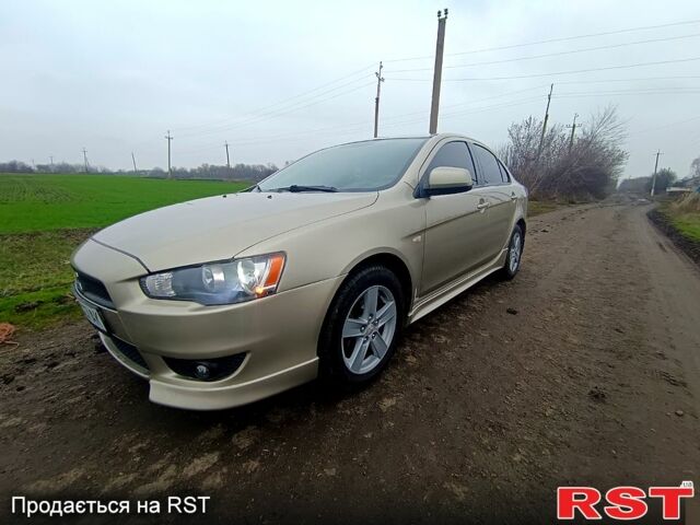 Бежевый Мицубиси Лансер, объемом двигателя 2 л и пробегом 160 тыс. км за 6500 $, фото 1 на Automoto.ua
