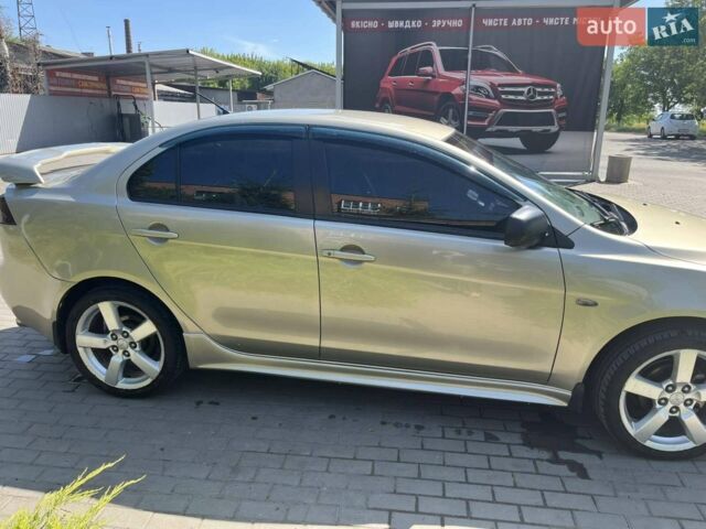 Бежевий Міцубісі Lancer, об'ємом двигуна 2 л та пробігом 202 тис. км за 5600 $, фото 1 на Automoto.ua