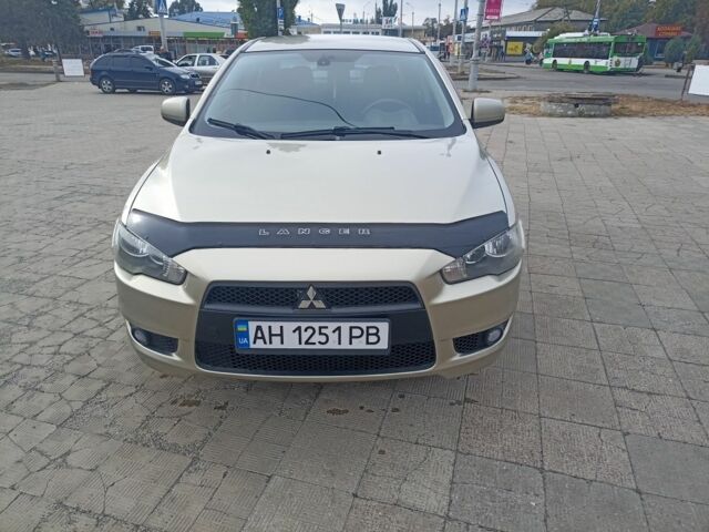 Бежевий Міцубісі Lancer, об'ємом двигуна 2 л та пробігом 340 тис. км за 5700 $, фото 1 на Automoto.ua