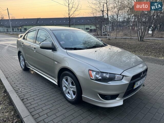 Бежевий Міцубісі Lancer, об'ємом двигуна 2 л та пробігом 99 тис. км за 9700 $, фото 1 на Automoto.ua