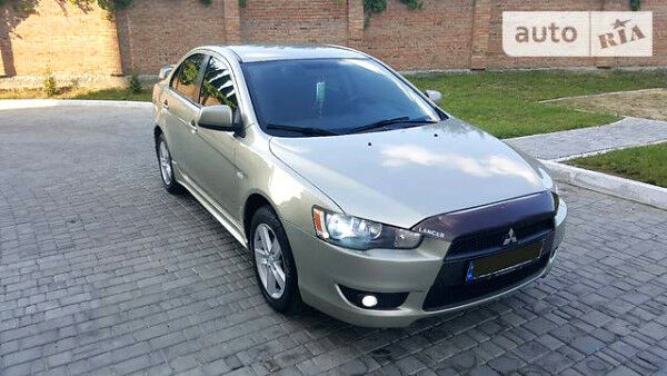 Бежевий Міцубісі Lancer, об'ємом двигуна 2 л та пробігом 134 тис. км за 8500 $, фото 1 на Automoto.ua