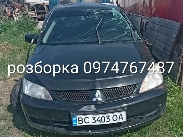 Черный Мицубиси Лансер, объемом двигателя 1.6 л и пробегом 135 тыс. км за 1500 $, фото 1 на Automoto.ua