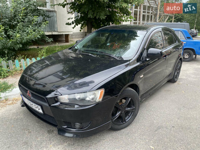 Чорний Міцубісі Lancer, об'ємом двигуна 1.8 л та пробігом 210 тис. км за 6499 $, фото 1 на Automoto.ua